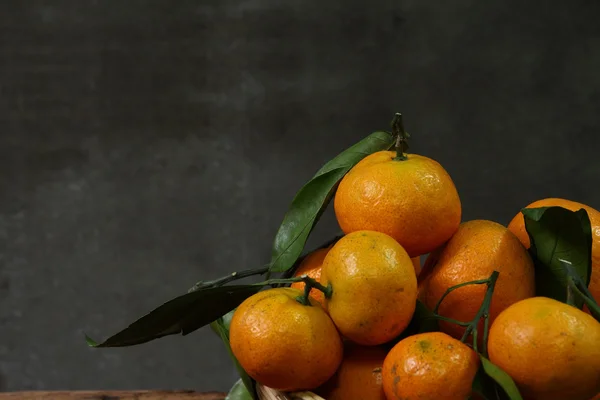 Still life with tangerines in basket — Stock Photo, Image