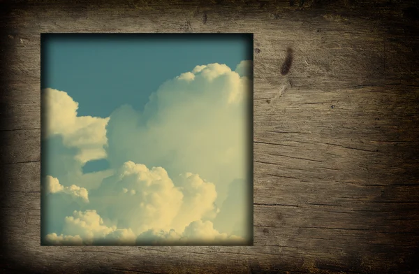 Old wood frame with blue sky white clouds image background — Stock Photo, Image