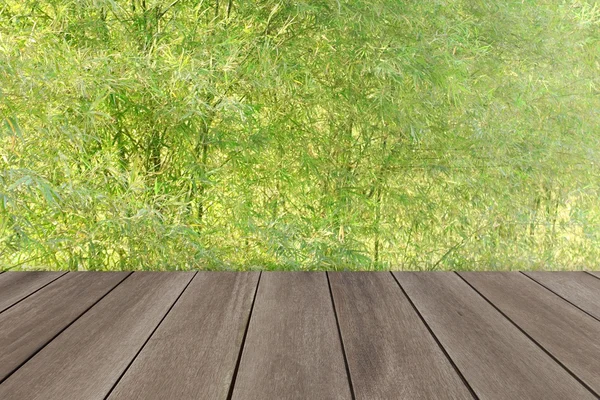 Grunge dřevěnou podlahu s pozadím plot bambus strom — Stock fotografie