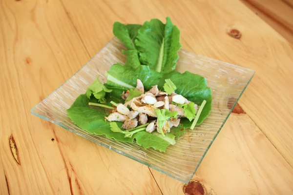 Fläsk krydda och grön sallad — Stockfoto