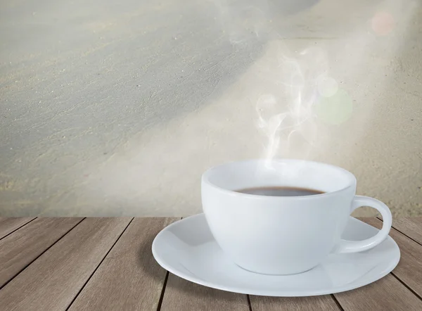 Coffee cup on wood board — Stock Photo, Image