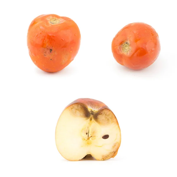 Manzana podrida y tomate —  Fotos de Stock