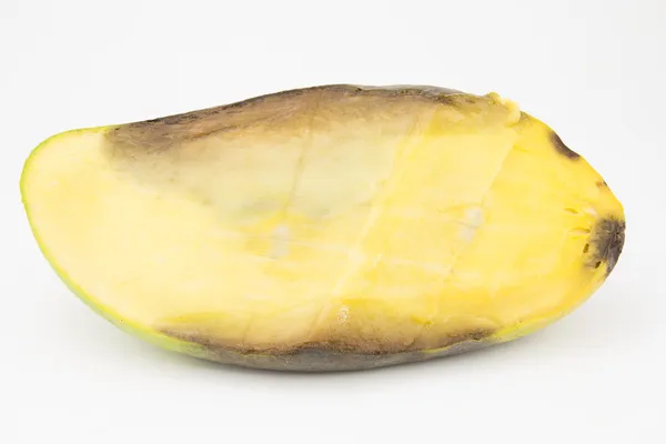 Rotten half mango fruit — Stock Photo, Image
