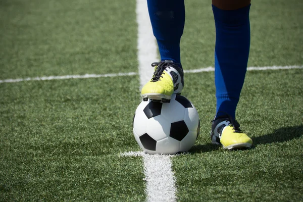 stock image Soccer player's feet on ball