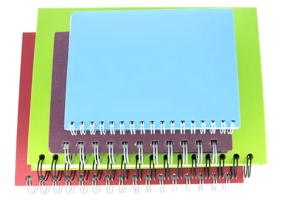 Stapel kleurrijke-laptops memo geïsoleerd op witte achtergrond — Stockfoto