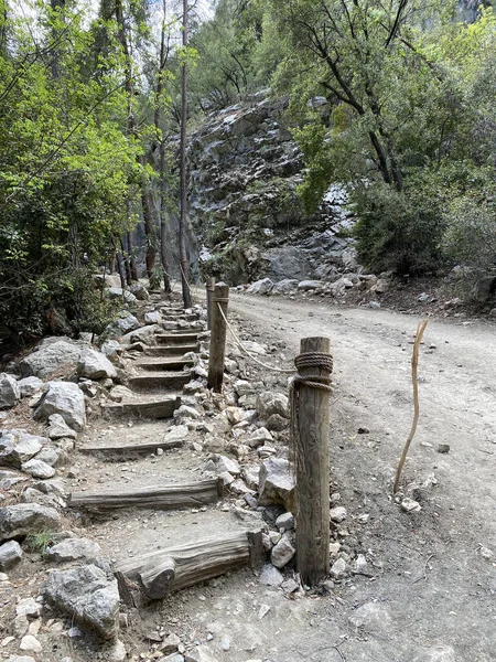 Stairs made from rock to make easy to climb. Looking Up Steep Stairs