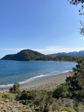 Türkiye 'nin Antalya kentindeki Phaselis Sahili - seyahat geçmişi. Antalya 'nın antik Phaselis plajının manzarası