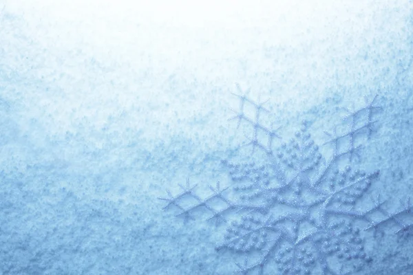 Snowflakes on snow