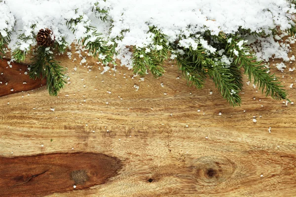 Christmas decorations covered in snow — Stock Photo, Image