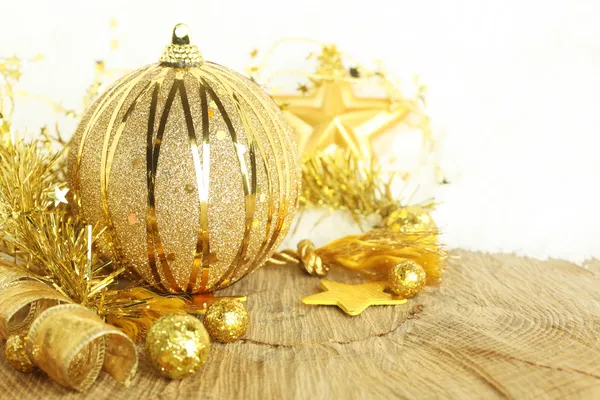 Golden Christmas ornaments — Stock Photo, Image