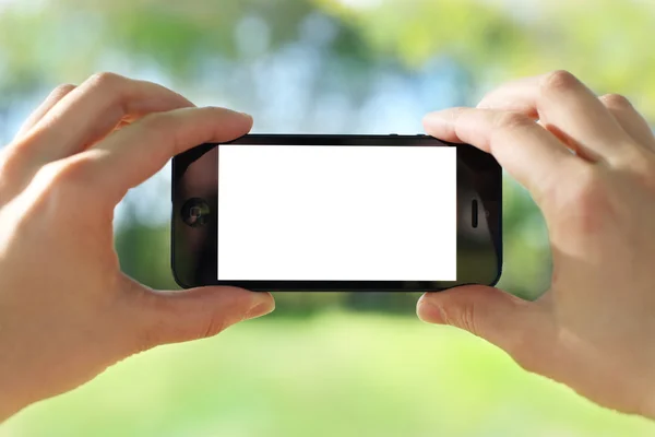 Tirar uma foto com um telefone inteligente — Fotografia de Stock