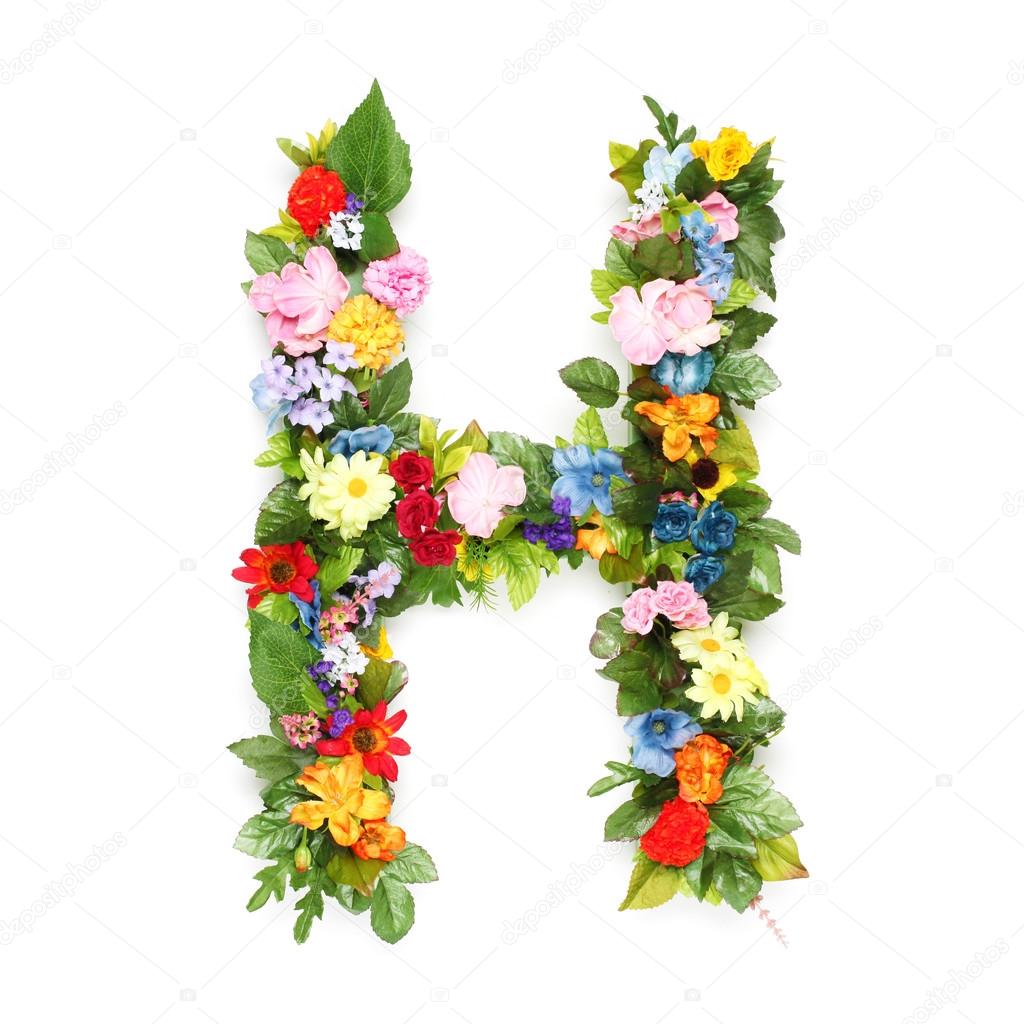 Letters made of leaves and flowers — Stock Photo © SSilver #50383247