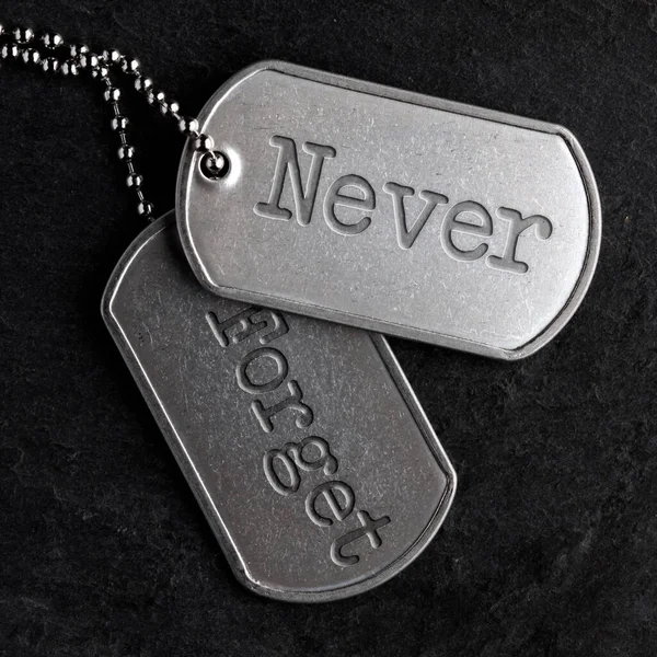 Old Worn Military Dog Tags Never Forget — Stock Fotó