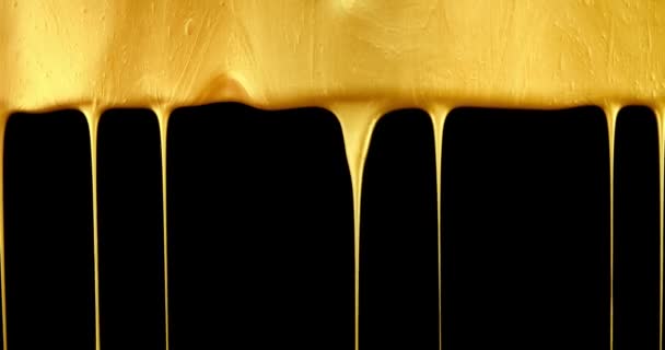 Vivid Metallic Gold Paint Flowing Dripping — Video