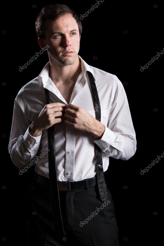 Man Unbuttoning His Shirt — Stock Photo © nickp37 36938133
