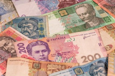 Ukrayna Hrivnia 'sının bir kompozisyonu. UAH banknotları, konuların iş, bankacılık, medya vs. olarak resmedilmesi için büyük seçenekler sunar.