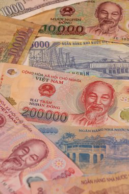 Konuları iş, bankacılık, medya vb olarak resmetmek için büyük seçenekler sunan bir Vietnam dong VND banknotları kompozisyonu.