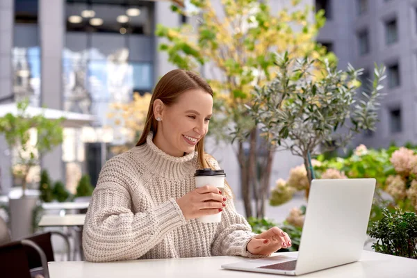Woman Chunky Knit Sweater Drink Coffee Communicates Web Camera City — Stock Photo, Image