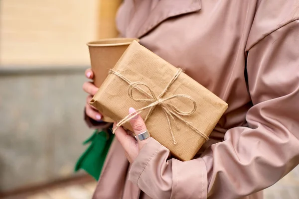 Woman Hold Paper Cup Coffee Carry Gift Box Congratulate Friend — Stock Photo, Image