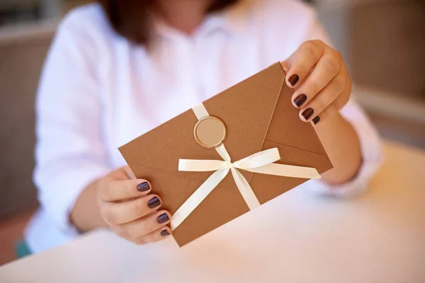 Woman Hands Holding Bronze Invitation Envelope Wax Seal Gift Certificate — Stock Photo, Image