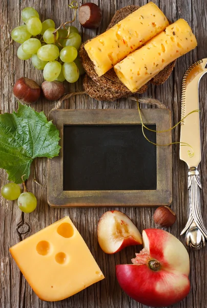 Cheese and fruit. — Stock Photo, Image