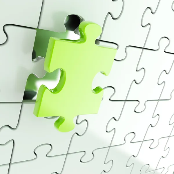 Puzzle puzzle sfondo con un unico pezzo spiccano — Foto Stock
