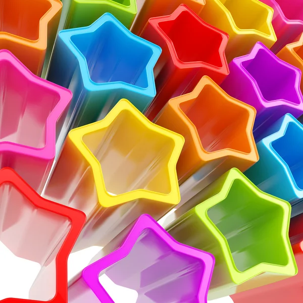 Fondo festivo hecho de estrellas extruidas de colores —  Fotos de Stock