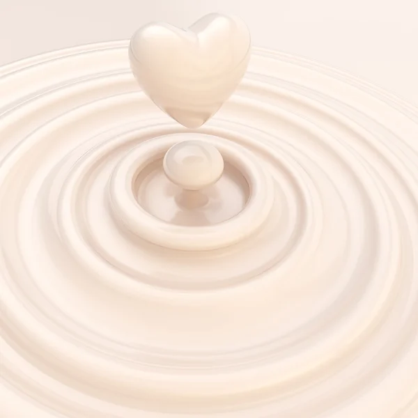 Simbolo di cuore fatto di crema di latte liquida — Foto Stock