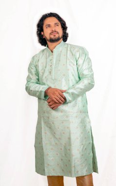 young indian male wearing green kurta side pose