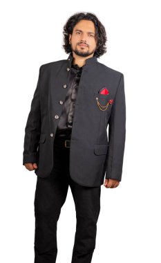 young indian male wearing black suit front pose