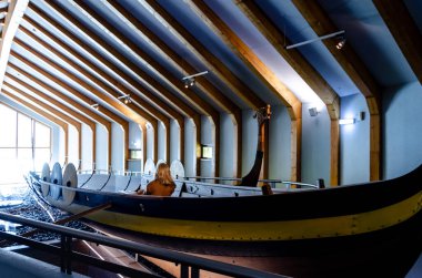 Busdorf, Germany - September 01, 2021: Ship in the Viking Museum Haithabu clipart