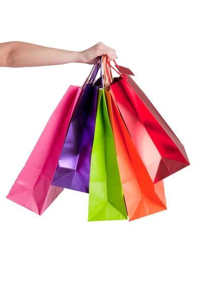 Mulher carregando sacos de compras — Fotografia de Stock