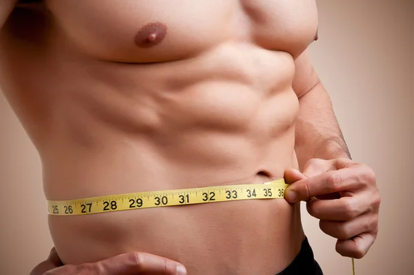 Fit Man Measuring His Waist — Stock Photo, Image