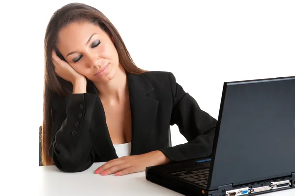Businesswoman Sitting at Her Desk Sleeping Stock Picture