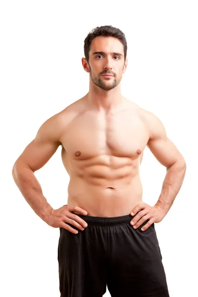 Fit Man Standing With Arms At His Waist — Stock Photo, Image