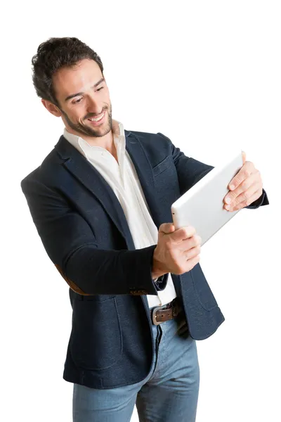 Casual Businessman Looking at a Tablet — Stock Photo, Image