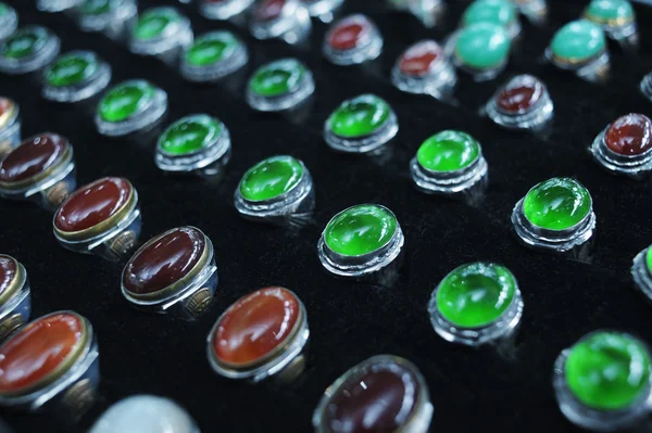 Silver Rings and color jade on Black Backbround — Stock Photo, Image