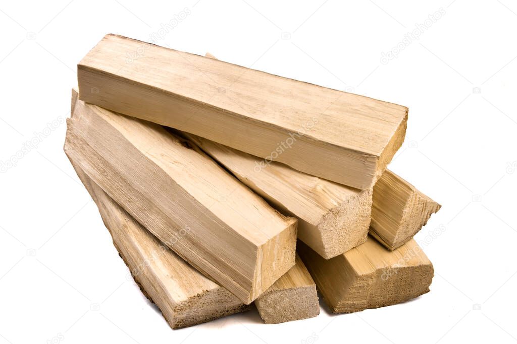 Pile of firewood isolated on a white background. For the fireplace.