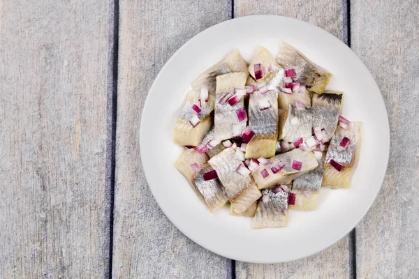 Marinated Herring Sliced Fish Fillet Plate Chopped Onion Table — Stock Photo, Image