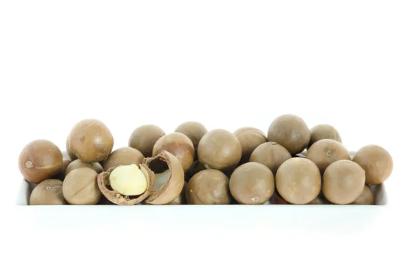 Macadamia en tazón — Foto de Stock