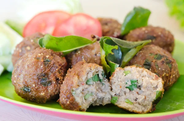 Spicy meatballs on dish — Stock Photo, Image