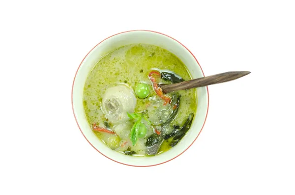 Curry in bowl with spoon — Stock Photo, Image