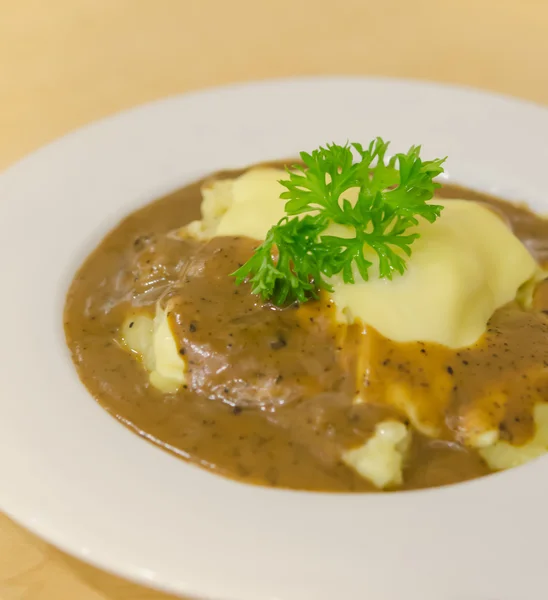 Mashed potato with gravy — Stock Photo, Image