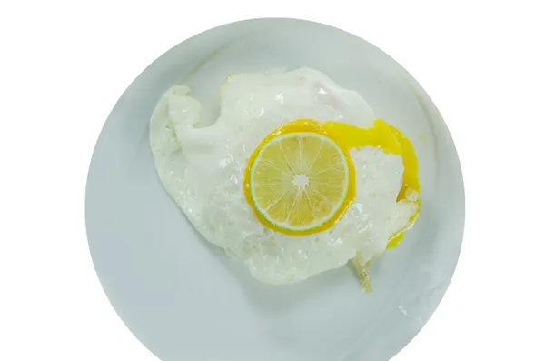 Fried egg and lime — Stock Photo, Image