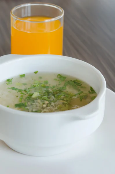 Rice soup and juice — Stock Photo, Image