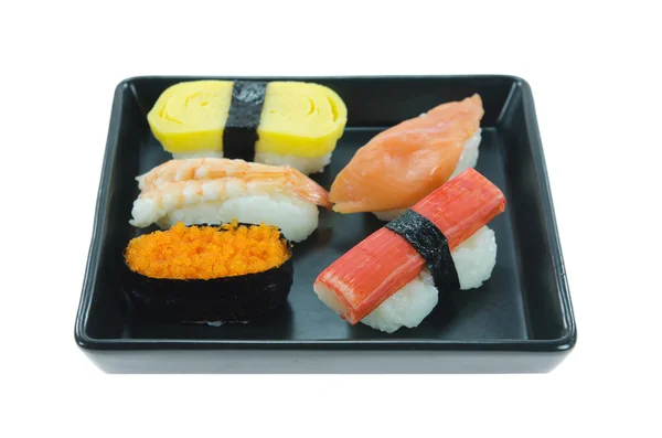 Mezcla de sushi en plato negro — Foto de Stock