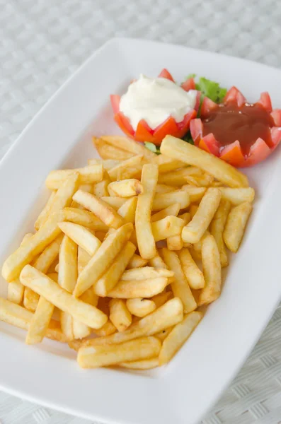 Patatine fritte sul piatto — Foto Stock