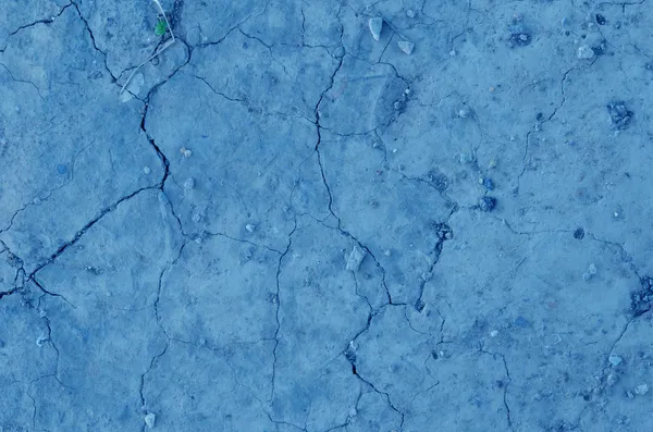 Blue cracked earth — Stock Photo, Image