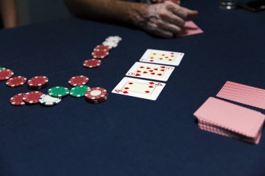 playing texas hold em poker, close up