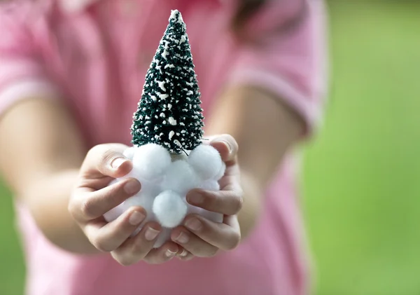 Family decorating Christmas tree — Stock Photo, Image